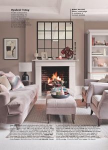 Living room in neutral paint color scheme with walls painted in Dulux Velvet Truffle