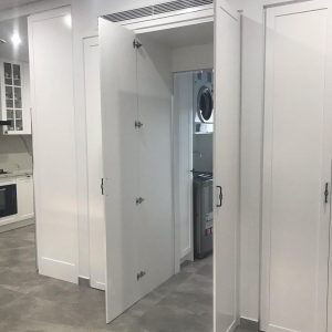 Linen closet with hidden door